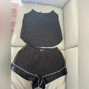 Victoria’s Secret silky pajama sleep set size medium black with pink details